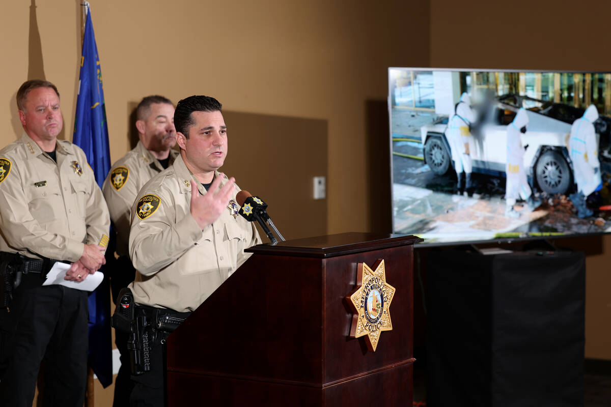 Metropolitan Police Department Assistant Sheriff Dori Koren shows a photo at Metropolitan Poli ...