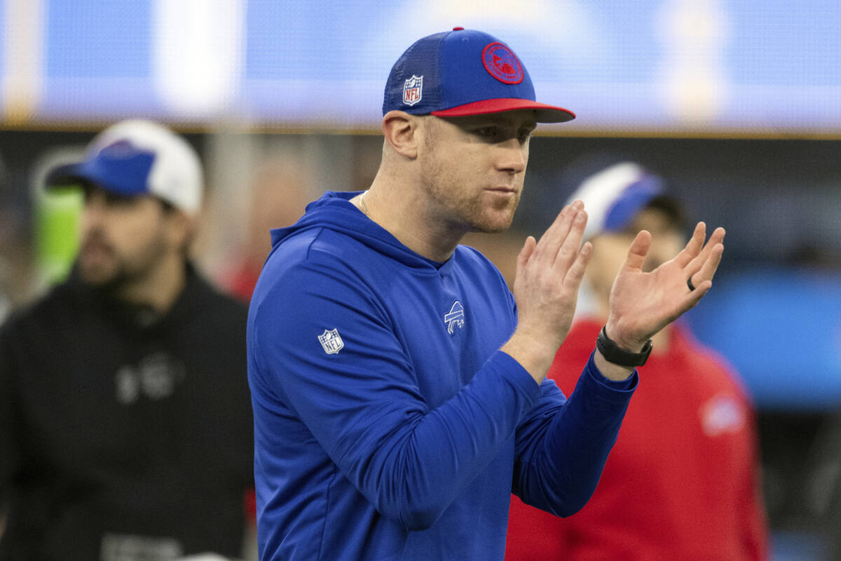 FILE - Buffalo Bills interim offensive coordinator Joe Brady looks on before an NFL football ga ...