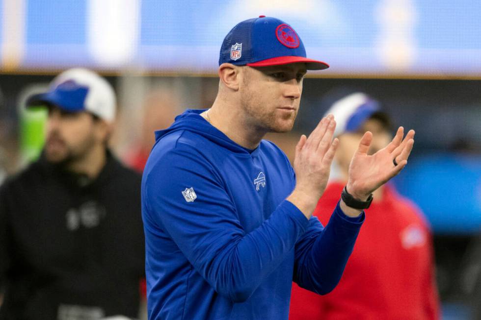 FILE - Buffalo Bills interim offensive coordinator Joe Brady looks on before an NFL football ga ...