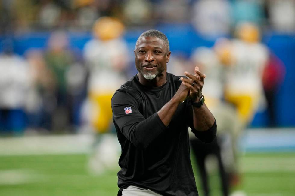 FILE - Detroit Lions defensive coordinator Aaron Glenn looks on during pregame of an NFL footba ...