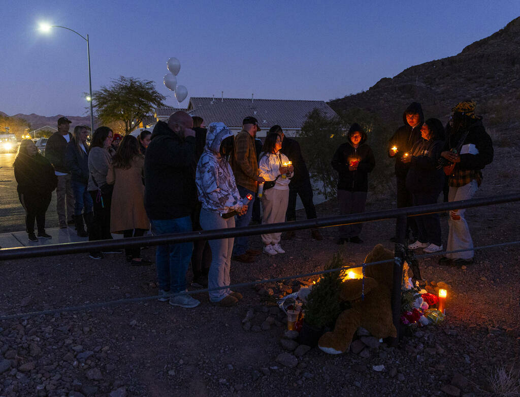 Family and friends gather during a vigil for Jennaleah Hin, 17, who was found dead on Jan. 5, 2 ...