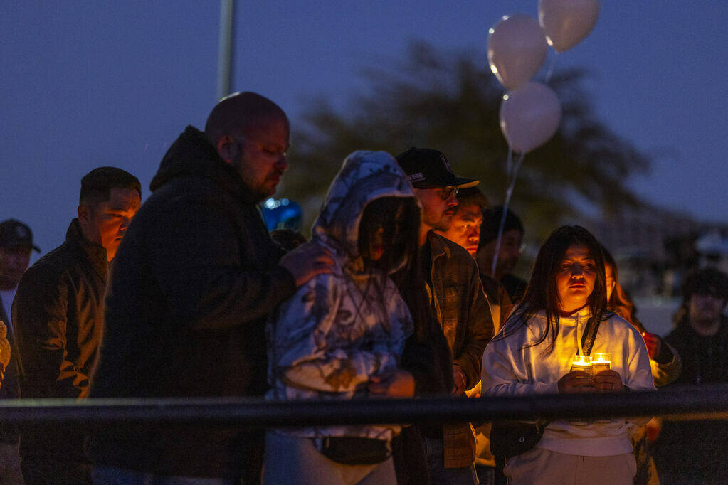 Family and friends gather during a vigil for Jennaleah Hin, 17, who was found dead on Jan. 5, 2 ...