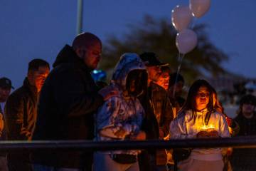 Family and friends gather during a vigil for Jennaleah Hin, 17, who was found dead on Jan. 5, 2 ...