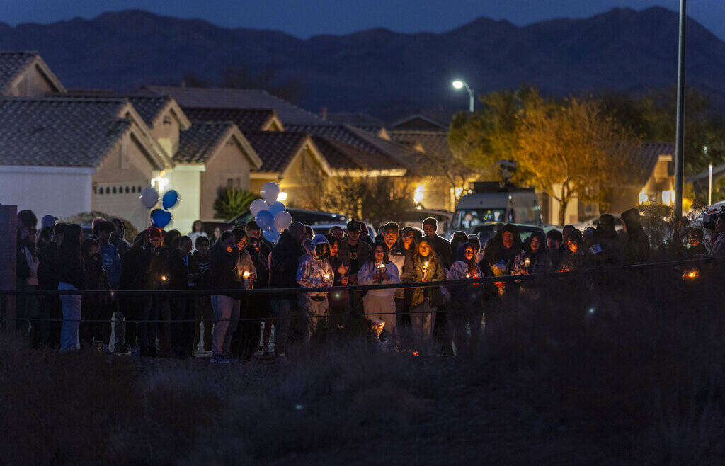 Family and friends gather during a vigil for Jennaleah Hin, 17, who was found dead on Jan. 5, 2 ...