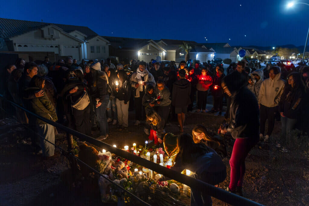 Family and friends gather during a vigil for Jennaleah Hin, 17, who was found dead on Jan. 5, 2 ...