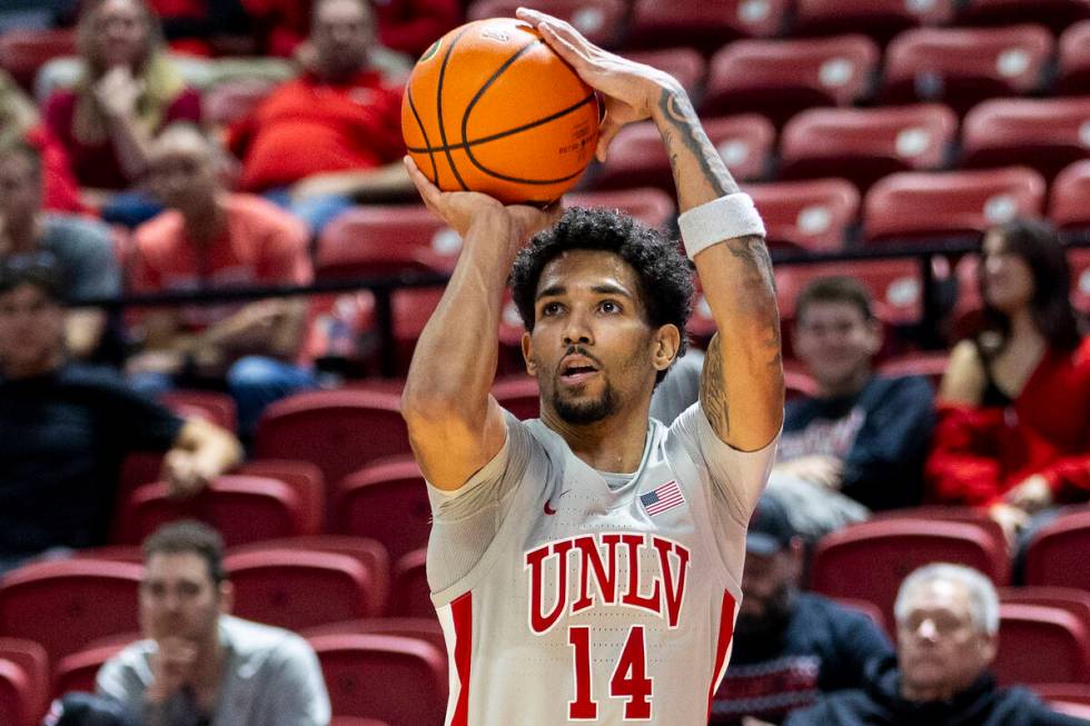 UNLV guard Jailen Bedford (14) attempts a three-point shot during the second half of the colleg ...