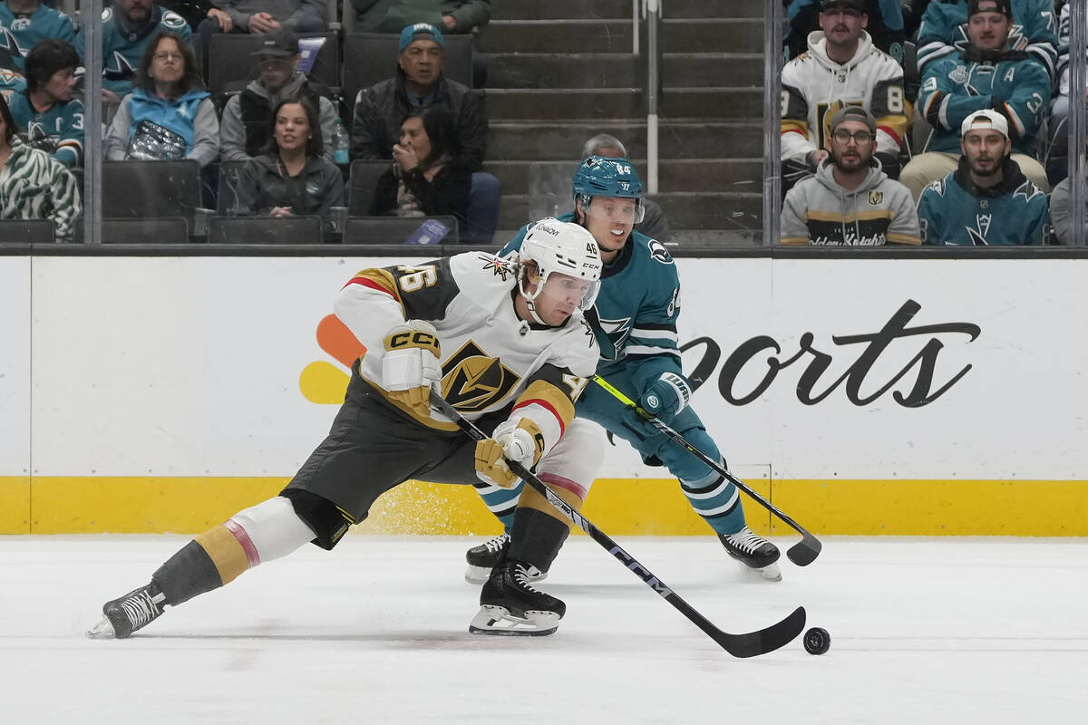 Vegas Golden Knights right wing Jonas Rondbjerg, foreground, skates toward the puck against San ...