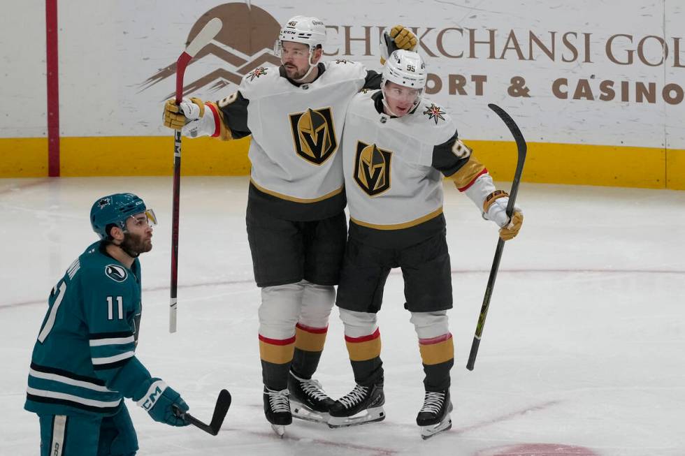 Vegas Golden Knights right wing Victor Olofsson, right, is congratulated by center Tomas Hertl, ...