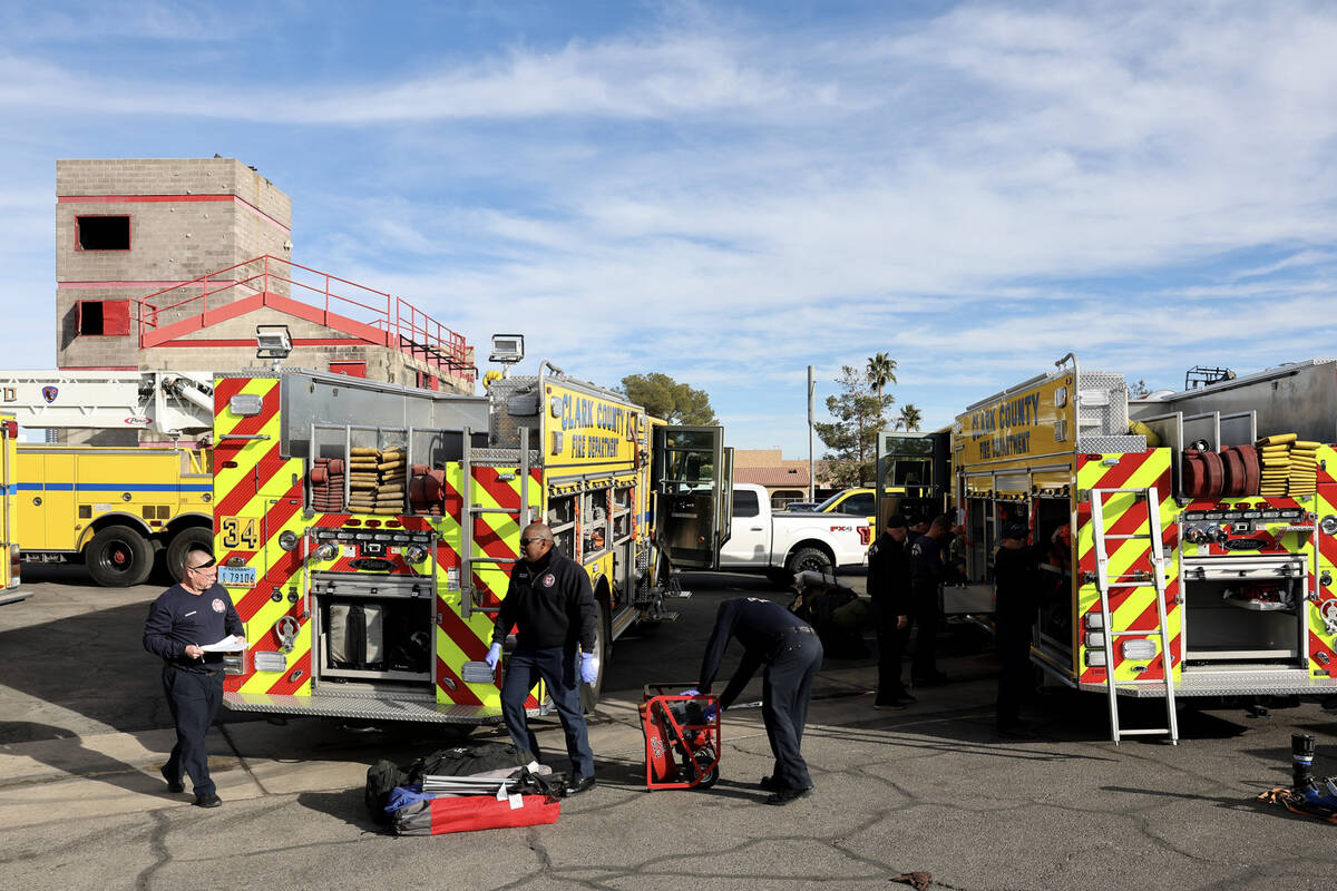 Firefighters from Clark County Fire Department, Las Vegas Fire and Rescue and Henderson Fire De ...