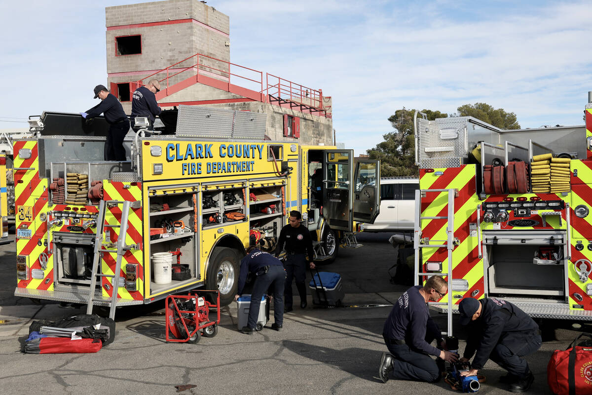 Firefighters from Clark County Fire Department, Las Vegas Fire and Rescue and Henderson Fire De ...