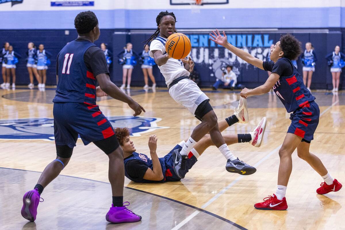 Centennial's Jayden Ceaser (5) gets off a pass against Liberty's Erik Alisca (0) during the fir ...