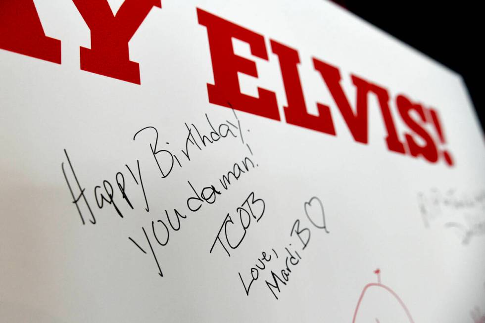 Birthday messages are seen on a giant card during a kick off to celebrate what would have been ...