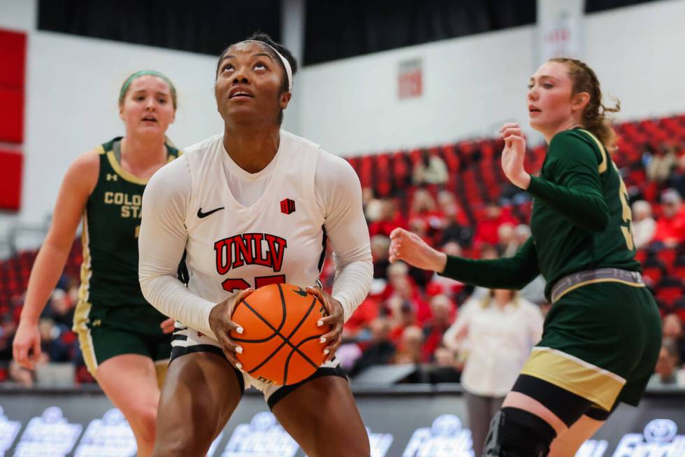 Lady Rebels guard Aaliyah Alexander (25) eyes the basket during an NCAA women’s basketba ...