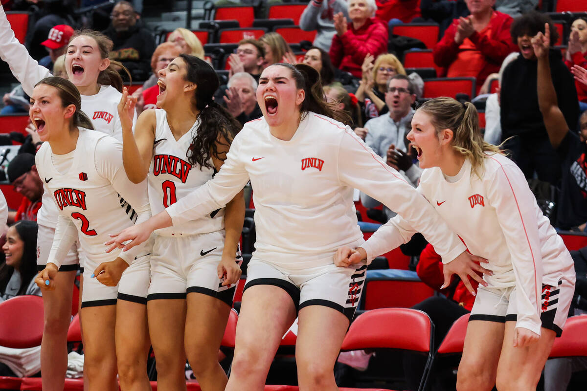 The Lady Rebels bench defends during an NCAA women’s basketball game between UNLV and Co ...