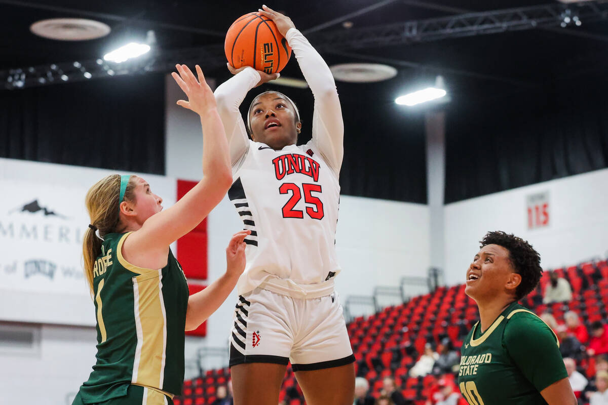 Lady Rebels guard Aaliyah Alexander (25) tosses the ball for a basket during an NCAA women&#x20 ...