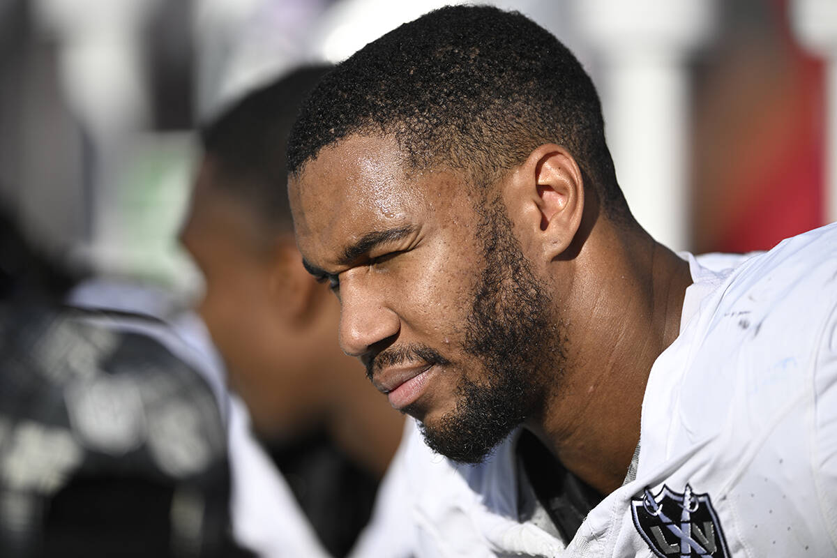 Las Vegas Raiders defensive end Charles Snowden looks on from the sideline during the second ha ...