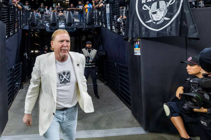 Raiders owner Mark Davis walks out of the tunnel during warm ups before facing the Los Angeles ...