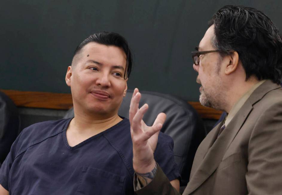 Yoni Barrios, left, listens to his attorney Jeff Maningo during his arraignment at the Regional ...