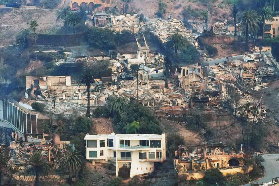 The devastation from the Palisades Fire is seen from the air in the Pacific Palisades neighborh ...