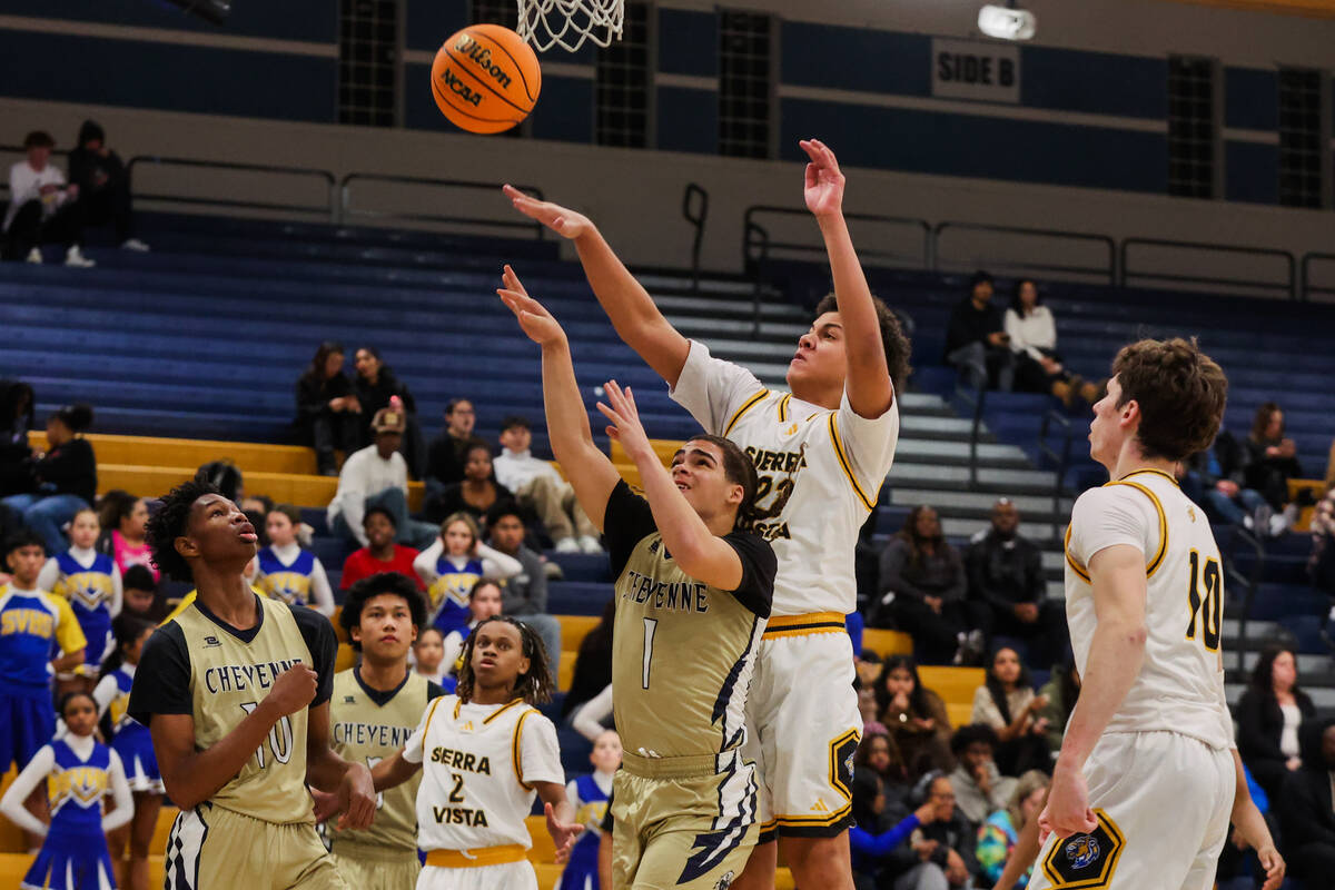 Cheyenne point guard Phoenix Dalton (1) attempts a basket during a high school boys basketball ...