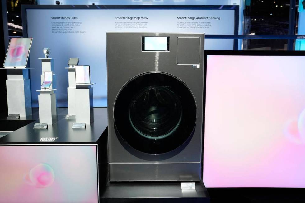 The Samsung Bespoke AI Washing Machine is displayed at a Samsung booth during the CES tech show ...