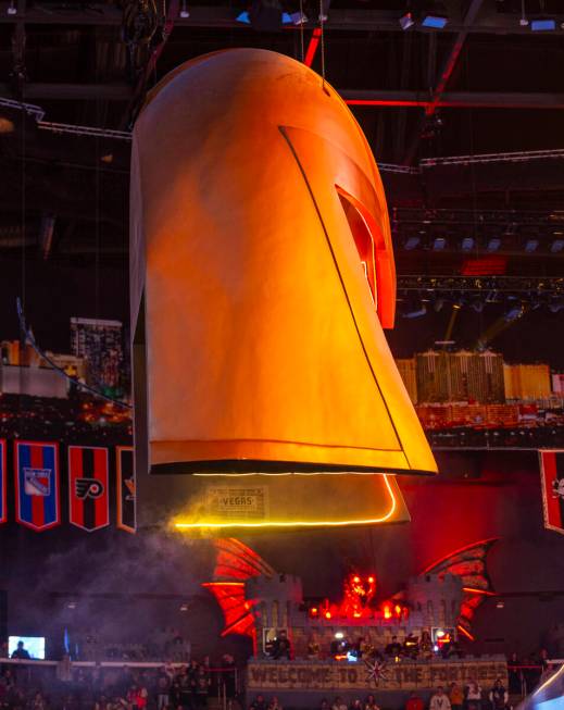 The helmet is elevated as the Golden Knights ready to face the New York Islanders during the fi ...