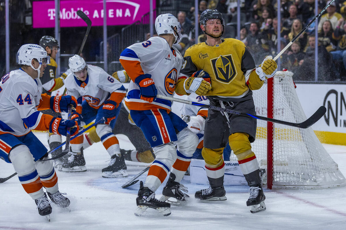 Golden Knights center Jack Eichel (9) misses a shot on goal against New York Islanders goaltend ...