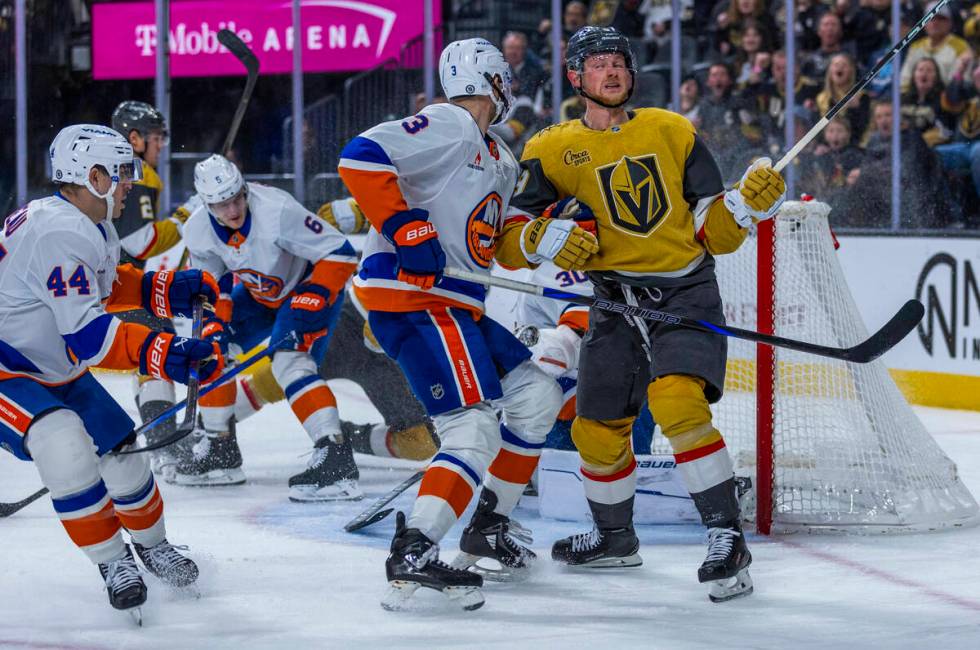 Golden Knights center Jack Eichel (9) misses a shot on goal against New York Islanders goaltend ...