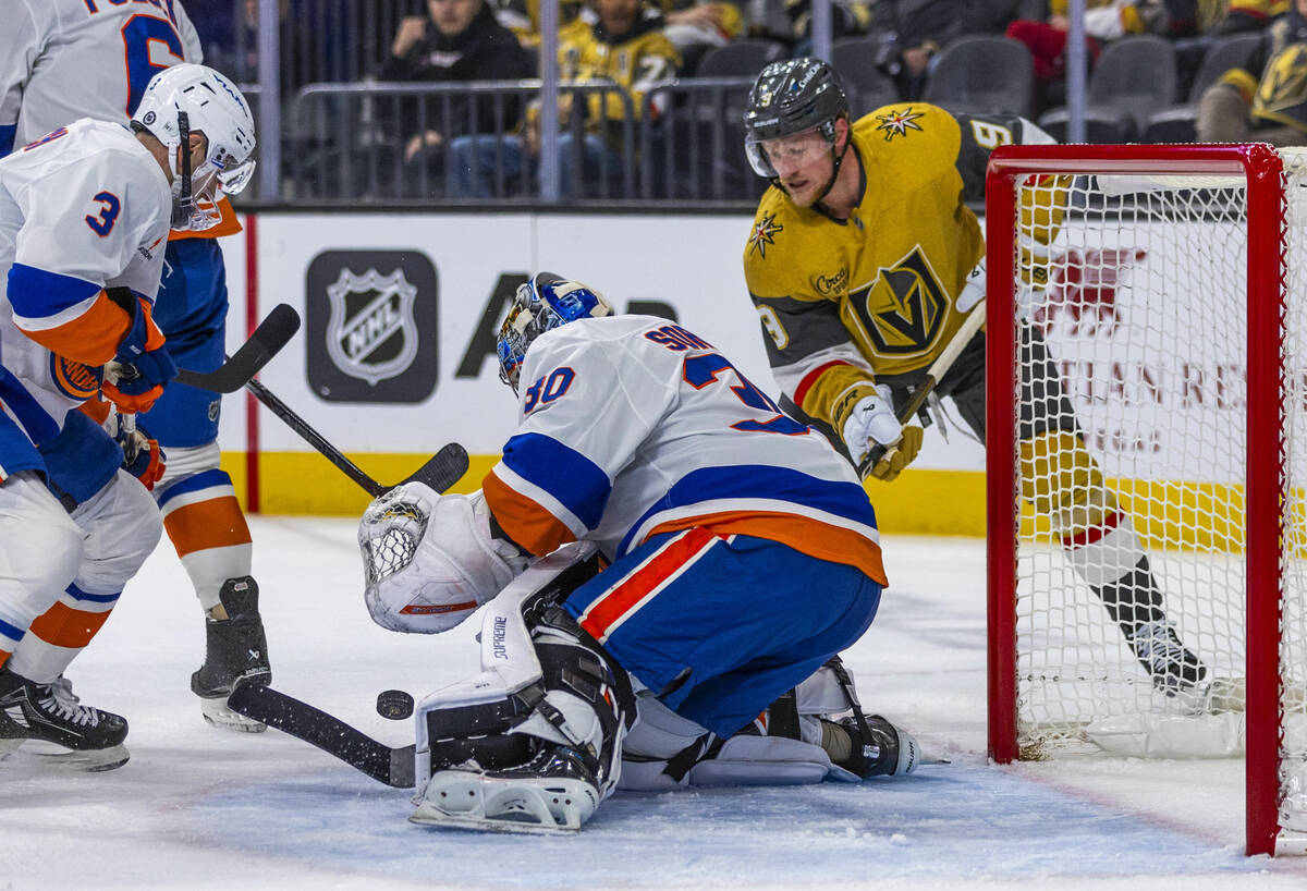 New York Islanders goaltender Ilya Sorokin (30) rejects another shot on goal by Golden Knights ...