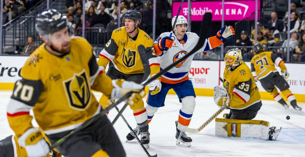 New York Islanders defenseman Mike Reilly (28) celebrates another team goal against Golden Knig ...