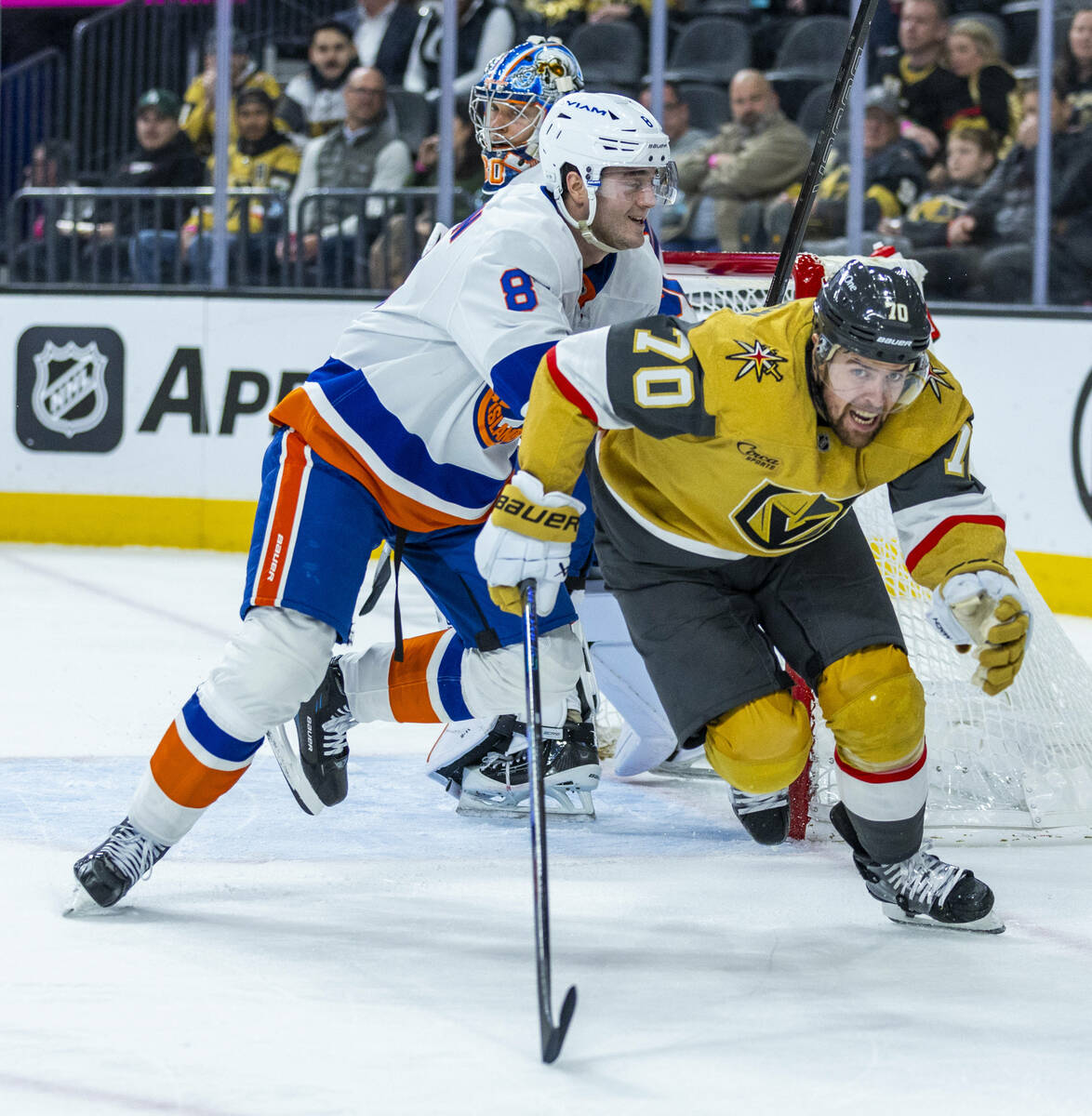 Golden Knights left wing Tanner Pearson (70) heads to the puck as New York Islanders defenseman ...