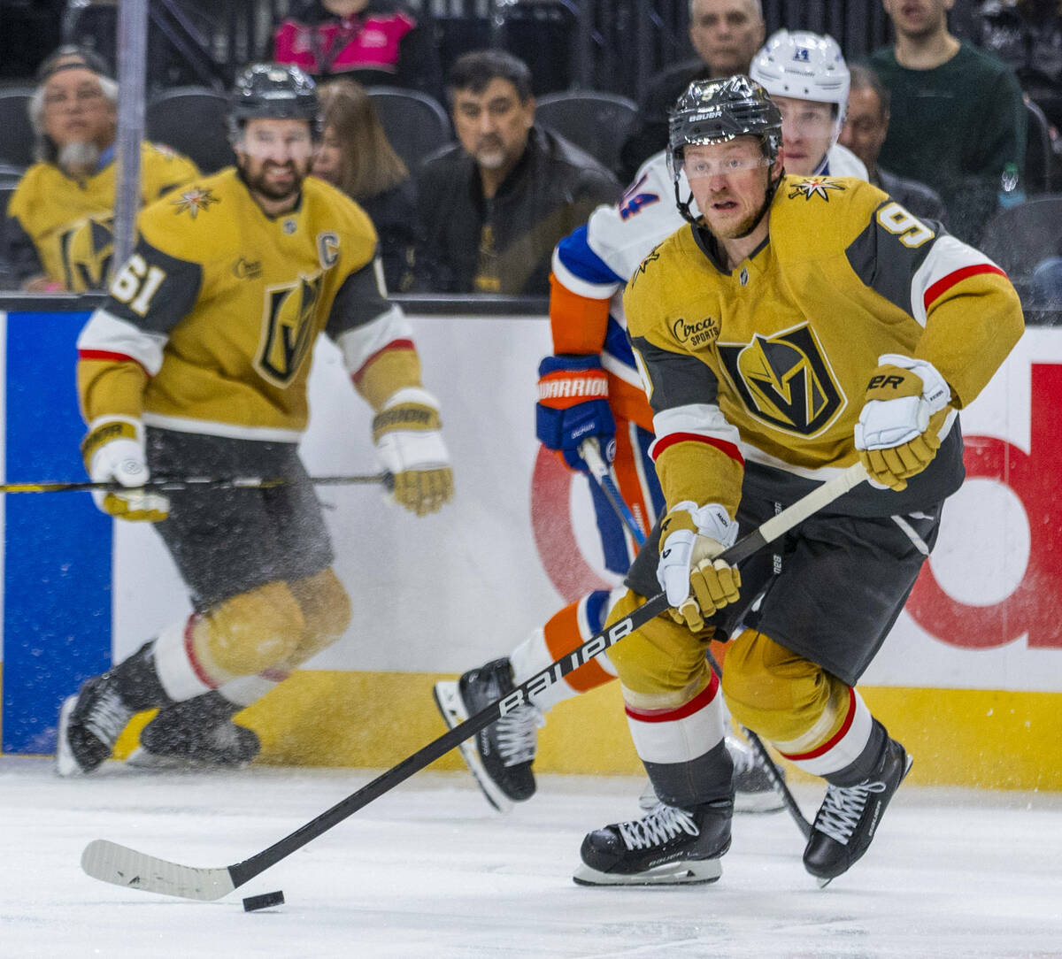 Golden Knights center Jack Eichel (9) drives with the puck as New York Islanders center Bo Horv ...