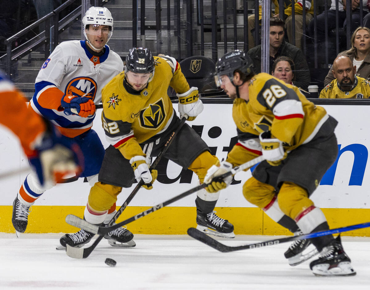 Golden Knights right wing Cole Schwindt (22) controls the puck over New York Islanders left win ...