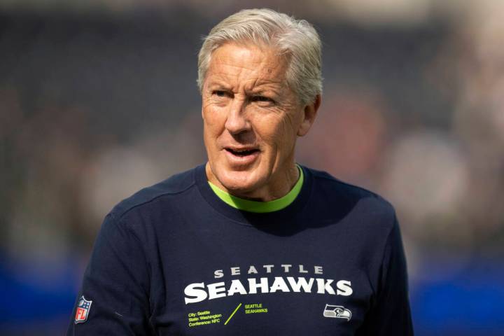 FILE - Seattle Seahawks head coach Pete Carroll looks on before an NFL football game against th ...