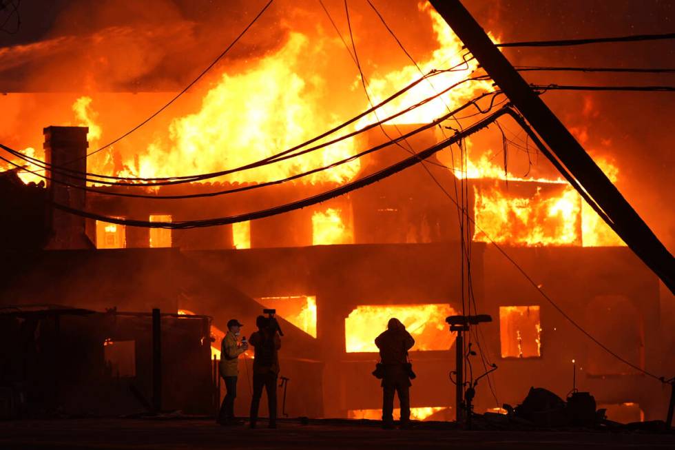 Beach front homes are destroyed by the Palisades Fire Wednesday, Jan. 8, 2025 in Malibu, Calif. ...