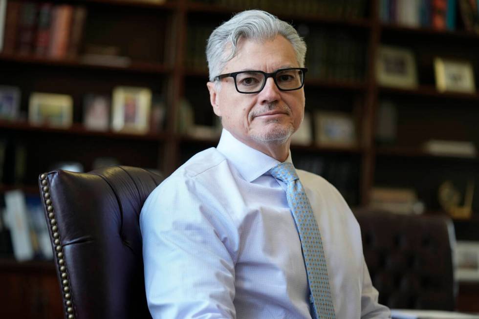 FILE - Judge Juan M. Merchan sits for a portrait in his chambers in New York, March 14, 2024. ( ...