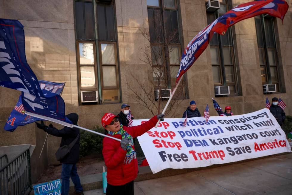 Demonstrators protest outside Manhattan criminal court before the start of the sentencing in Pr ...