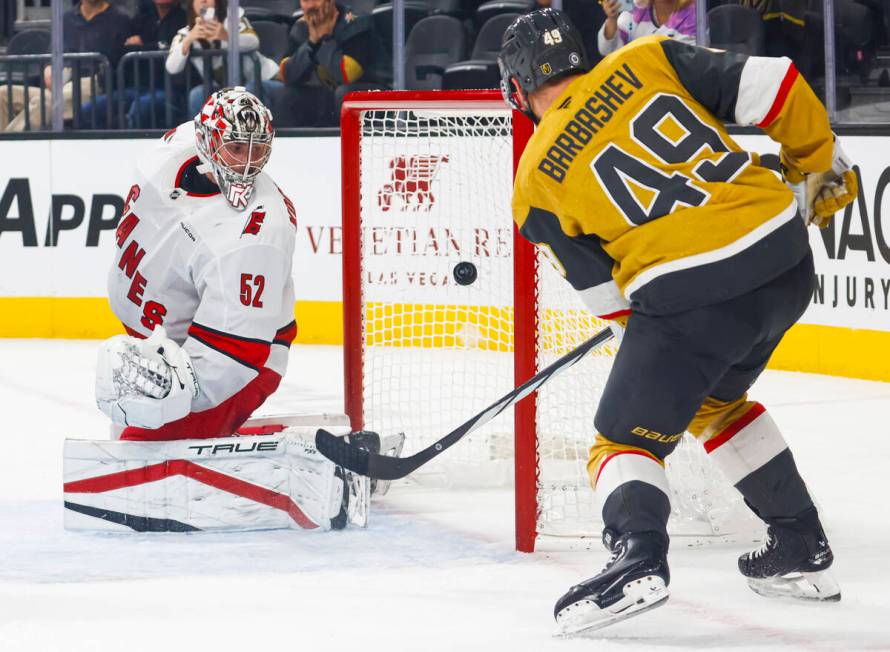 Golden Knights center Ivan Barbashev (49) scores a goal against Carolina Hurricanes goaltender ...