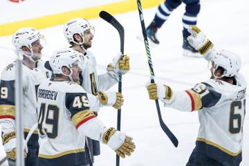 Vegas Golden Knights' Jack Eichel (9), Ivan Barbashev (49), Shea Theodore (27) and Mark Stone ( ...