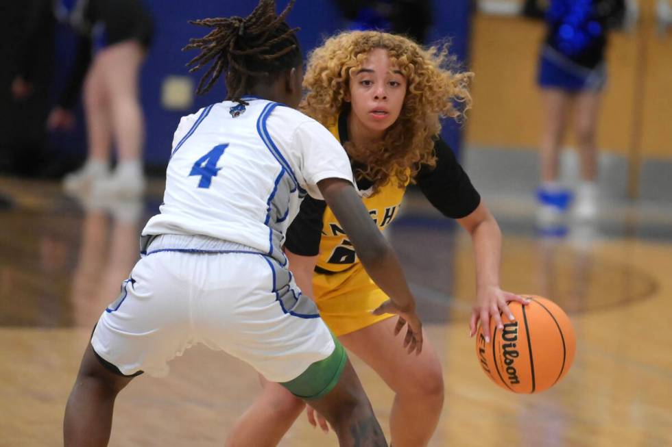 Desert Pines' Taveah Oliver guards Democracy Prep's Aryana Edwards during their NIAA basketball ...