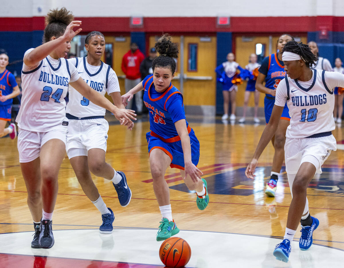 Centennial forward Nation Williams (24) runs down the court as Bishop Gorman guard Aaliah Spaig ...