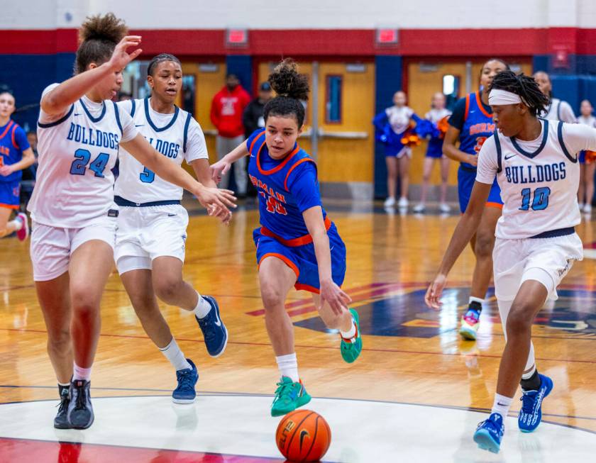 Centennial forward Nation Williams (24) runs down the court as Bishop Gorman guard Aaliah Spaig ...