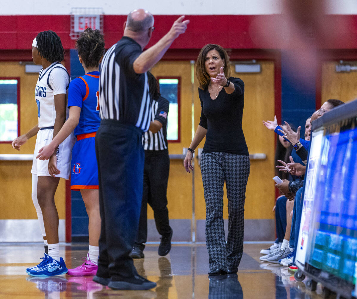 Bishop Gorman head coach Sheryl Krmpotich argues a possession call for Centennial during the se ...