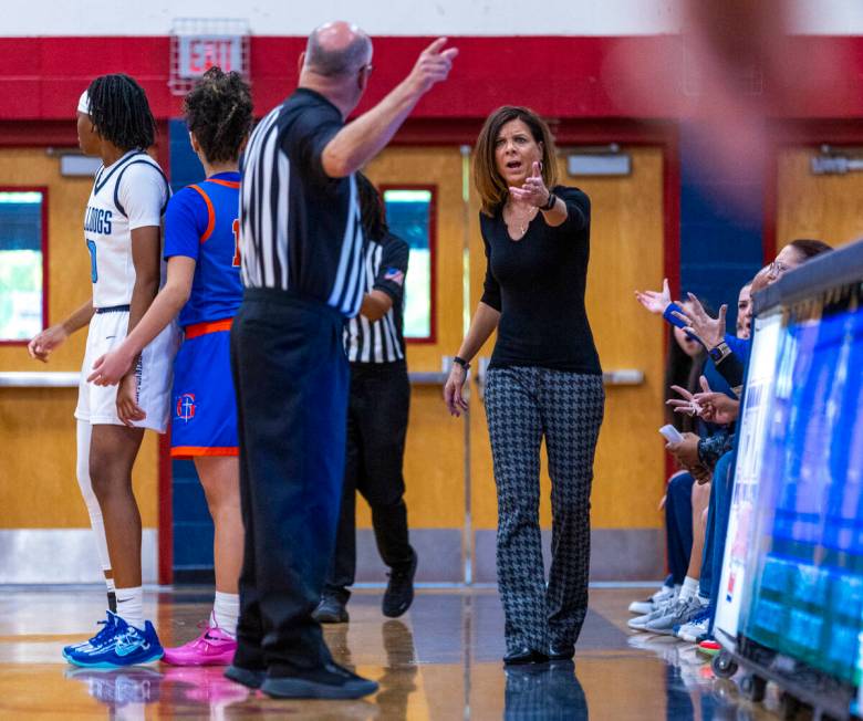 Bishop Gorman head coach Sheryl Krmpotich argues a possession call for Centennial during the se ...