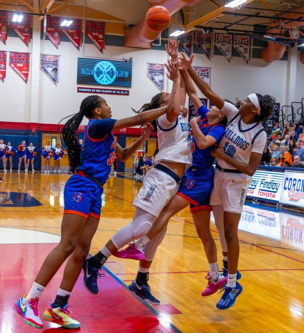 Bishop Gorman center Aubrey Johnson (32), Centennial forward Ayla Williams (12), Bishop Gorman ...