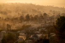 The devastation of the Palisades Fire is seen in the early morning in the Pacific Palisades nei ...