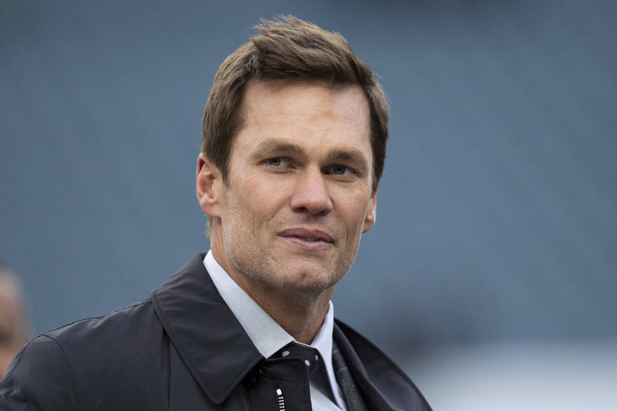 Former NFL player and Fox NFL host Tom Brady looks on prior to the NFL football game between th ...