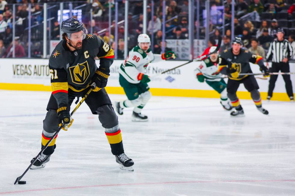 Golden Knights right wing Mark Stone (61) eyes the net as he skates the puck closer during an N ...