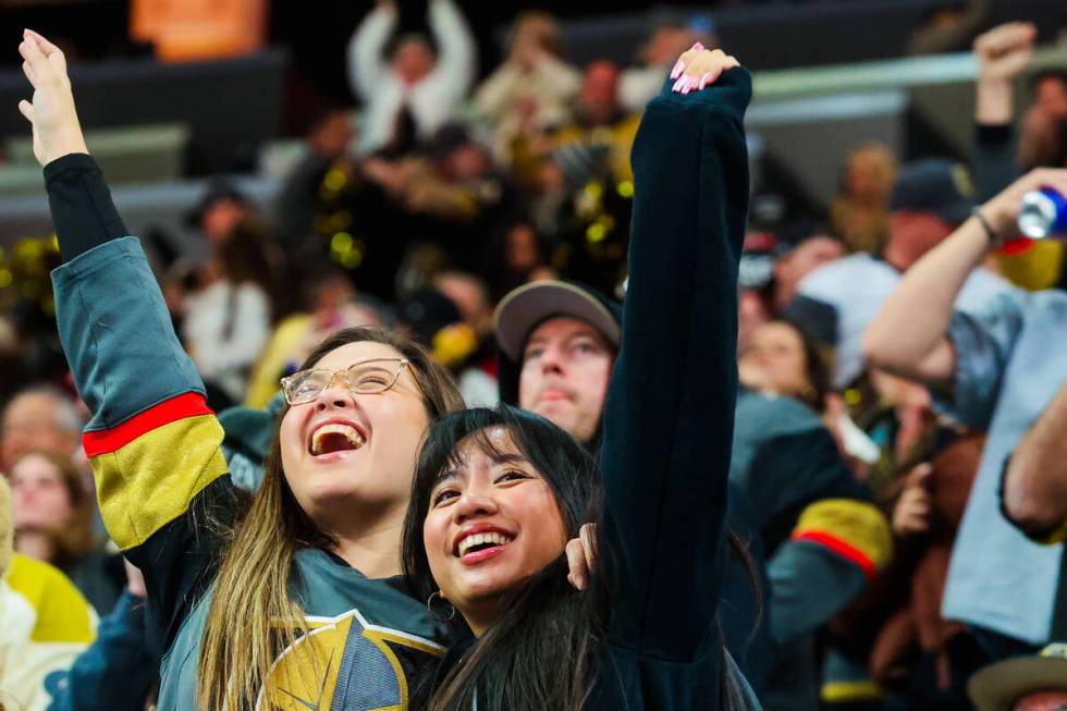 Golden Knights fans celebrate a goal during an NHL hockey game between the Golden Knights and M ...