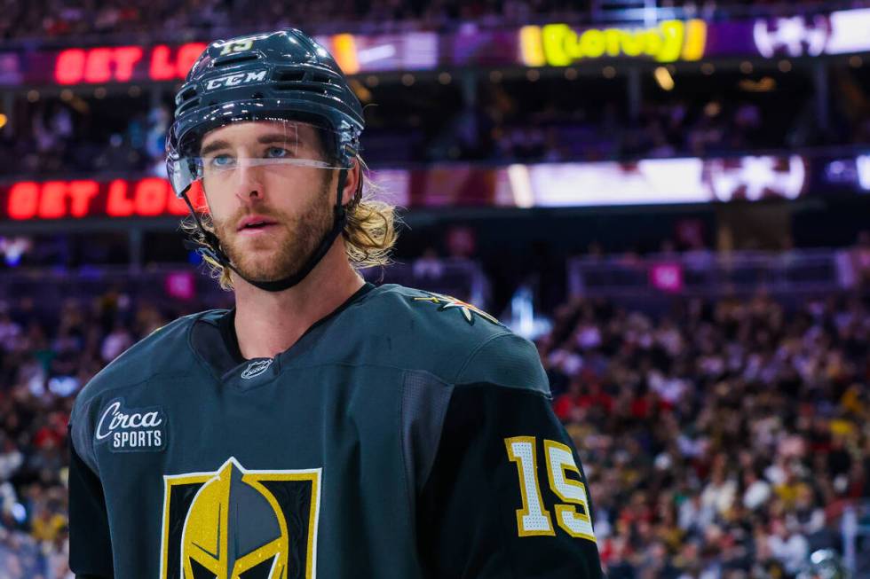 Golden Knights defenseman Noah Hanifin (15) gets ready for a puck drop during an NHL hockey gam ...